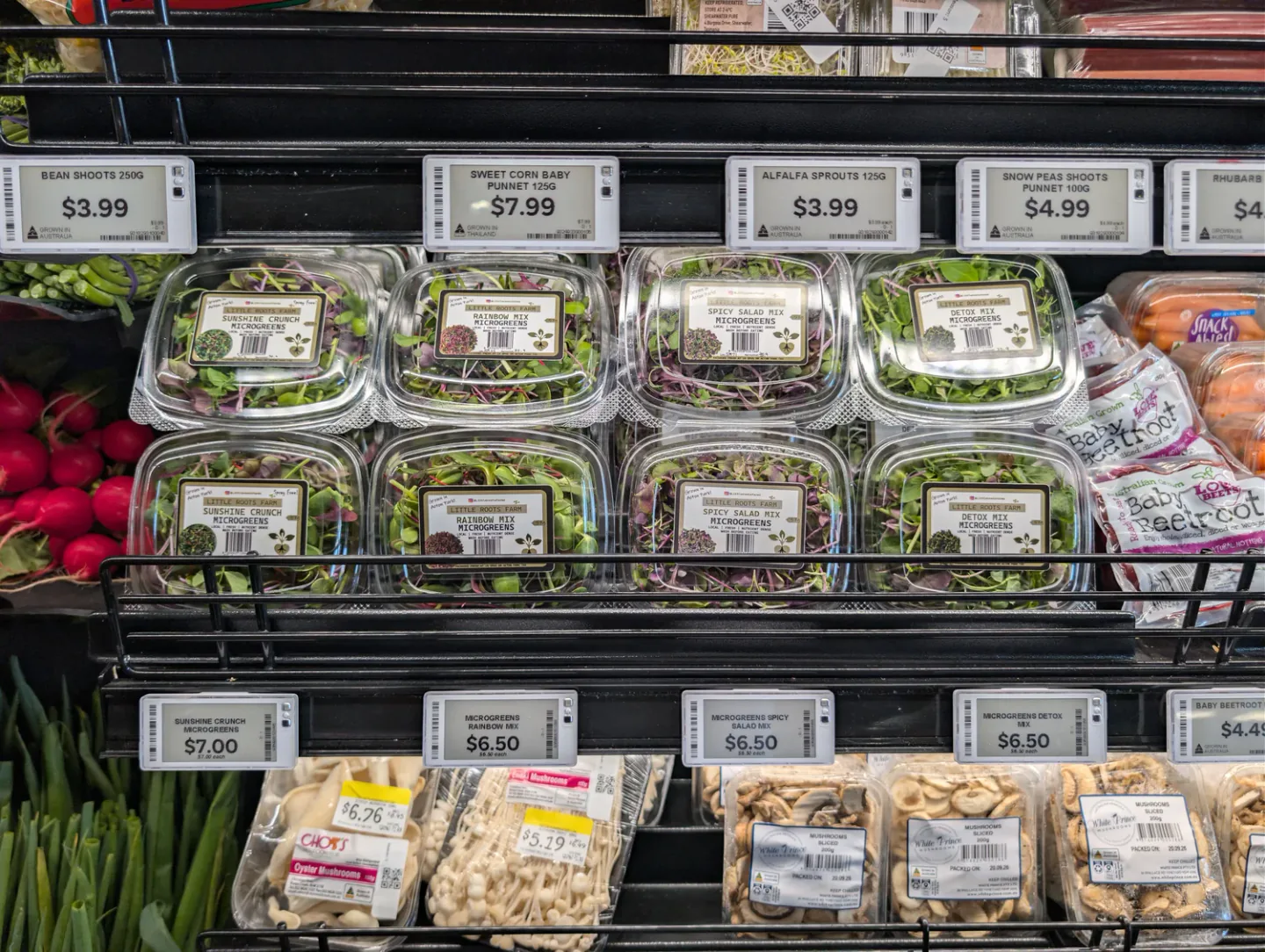 Little Roots microgreen mixes in the fresh produce section at Salamanca Fresh